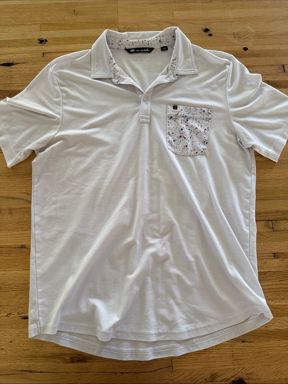 Travis Mathew White Polo with Speckled Pocket